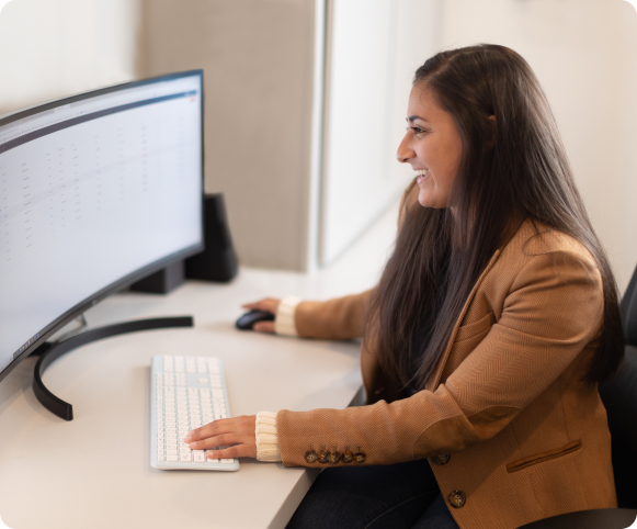 Woman at desk with AI